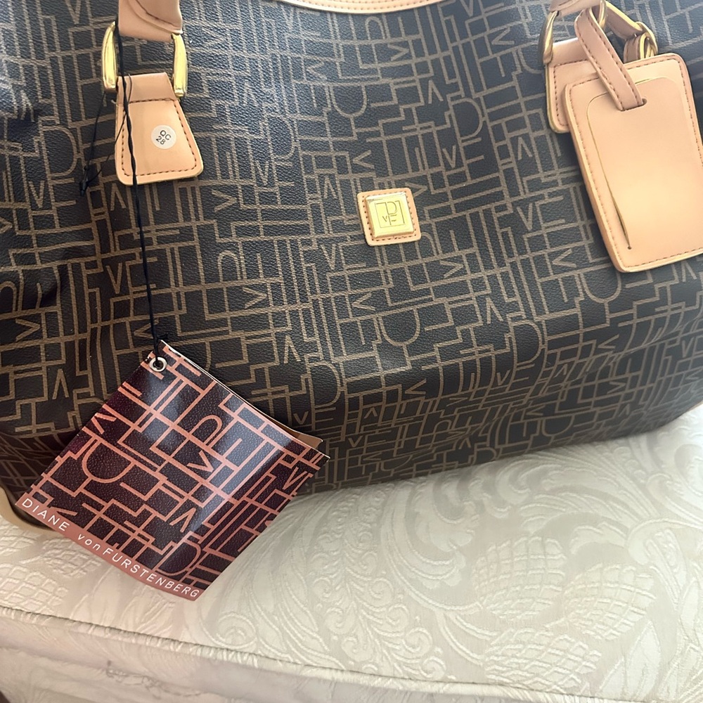 Diane Von Furstenberg Wheeled City Bag in Brown